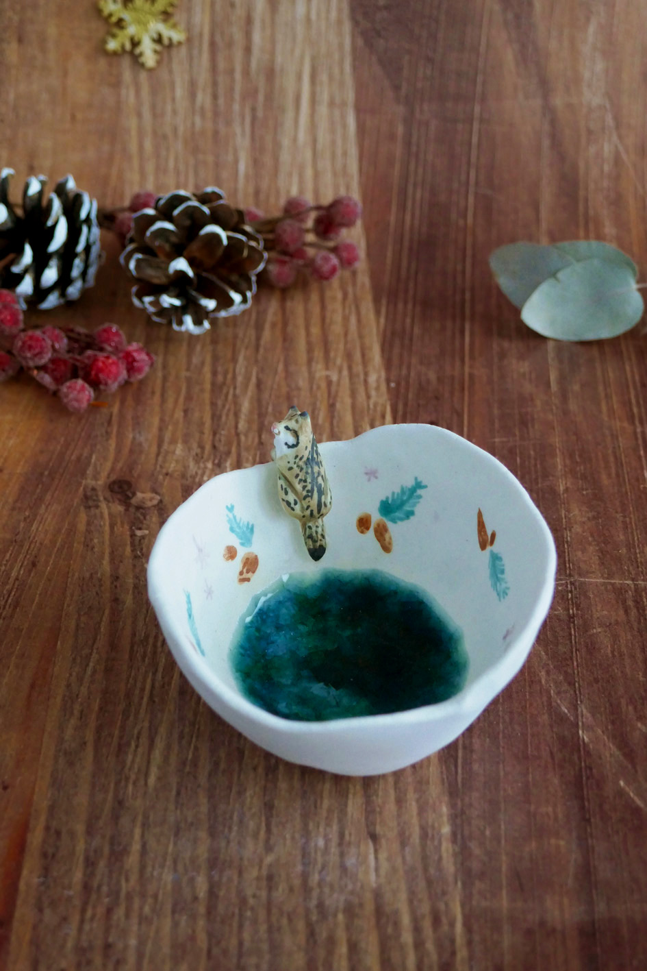 Petit bol pincé en porcelaine "Lynx aux sapins"